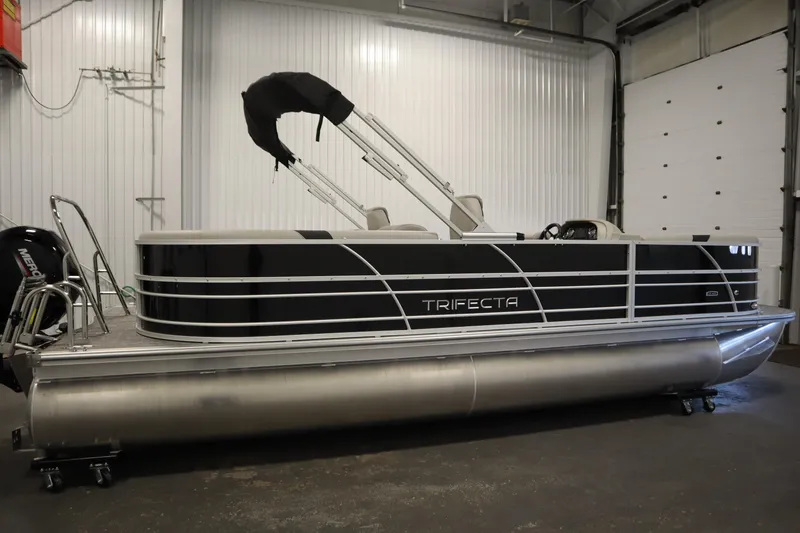 Slide: The Image of 2025 Trifecta 24RF LE 2.75 pontoon boat interior with spacious seating and modern design. - 3