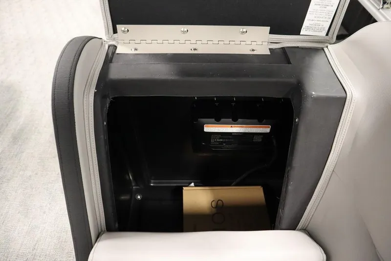 Slide: The Image of Storage compartment in 2025 Trifecta 24RF LE 2.75 boat, featuring secure interior space. - 39