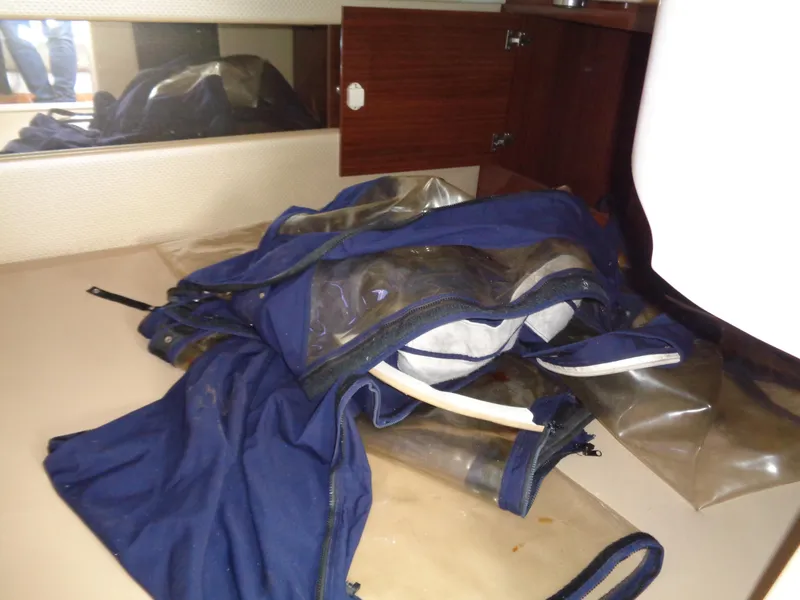 Slide: The Image of Blue canvas cover inside 2014 Regal 3060 Window Express boat cabin. - 24