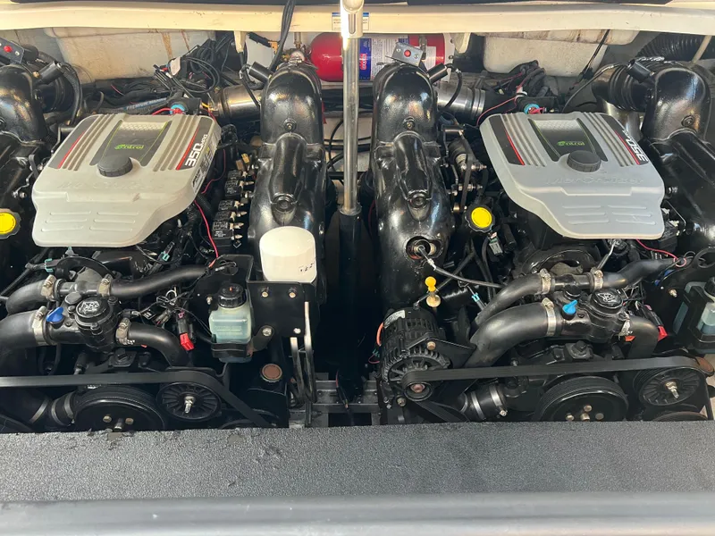 Slide: The Image of Twin engines of a 2013 Sea Ray 300 SLX boat, detailed view. - 10