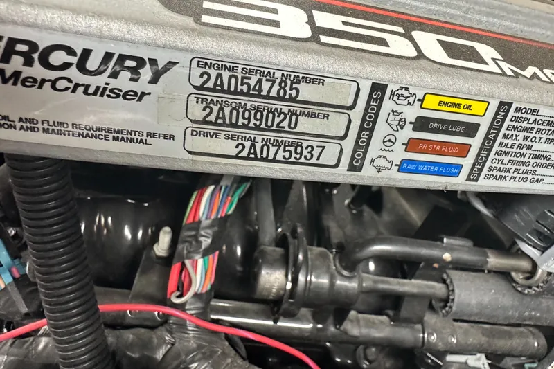 Slide: The Image of Close-up of a 2013 Sea Ray 300 SLX Mercury MerCruiser engine with serial numbers. - 12