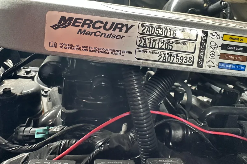 Slide: The Image of Mercury MerCruiser engine label on 2013 Sea Ray 300 SLX boat. - 13
