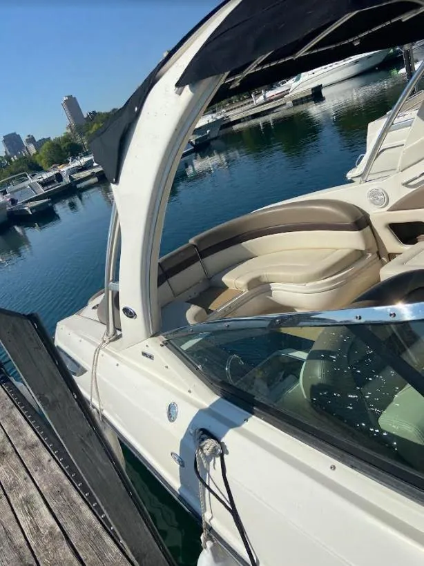 Slide: The Image of 2013 Sea Ray 300 SLX boat docked at marina, sunny day. - 16