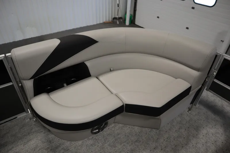 Slide: The Image of Luxurious interior of 2025 Trifecta 22TRFC LE 2.75 pontoon boat with plush seating. - 10