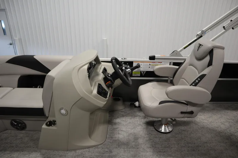 Slide: The Image of Luxurious seating in the 2025 Trifecta 22TRFC LE 2.75 pontoon boat, featuring sleek design. - 13