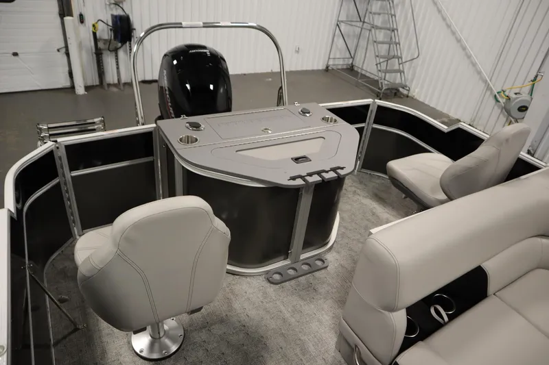 Slide: The Image of 2025 Trifecta 22TRFC LE 2.75 boat interior with steering console and captain's chair. - 20