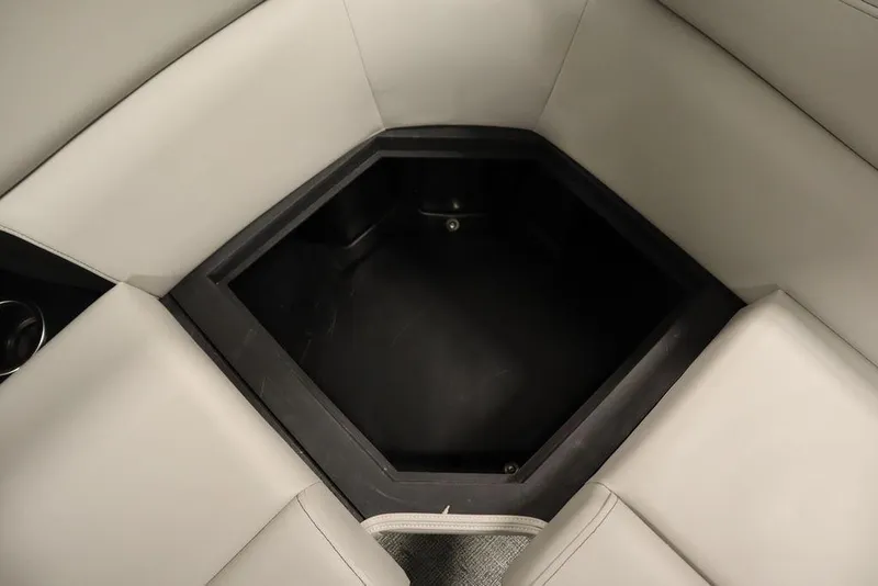 Slide: The Image of 2025 Trifecta 22TRFC LE 2.75 boat interior storage compartment with cushioned seating. - 31