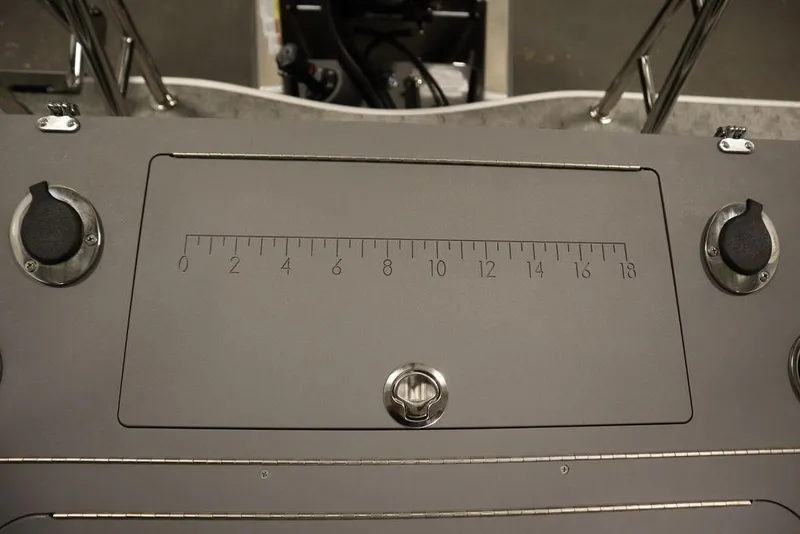 Slide: The Image of Control panel of 2025 Trifecta 22TRFC LE 2.75 boat with measurement scale. - 45
