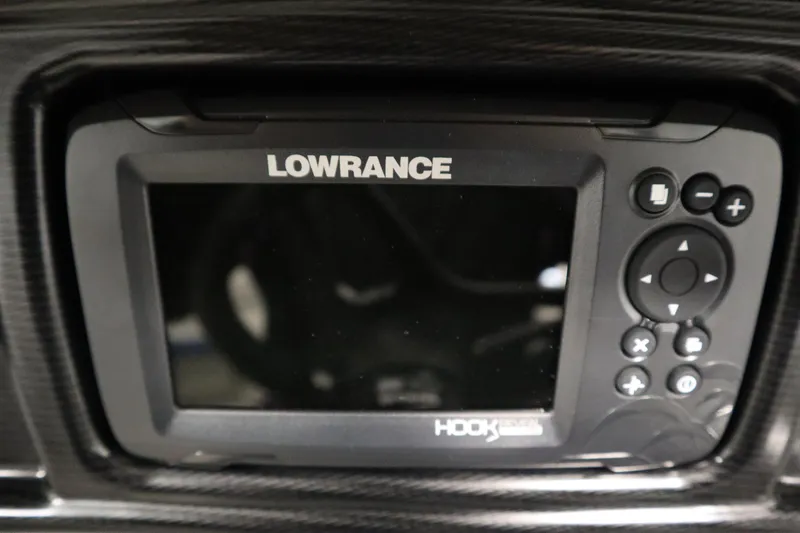 Slide: The Image of 2025 Trifecta 22RF LE 2.75 boat interior with beige and blue seating. - 15