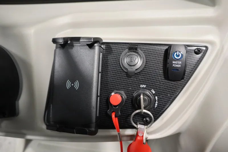 Slide: The Image of Storage compartment in 2025 Trifecta 22RF LE 2.75 boat with cushioned seating. - 16