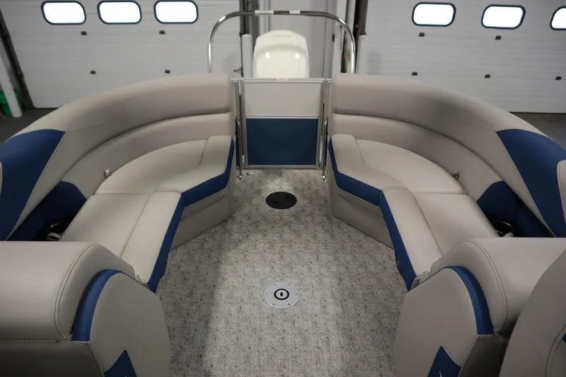 Slide: The Image of Interior storage compartment of 2025 Trifecta 22RF LE 2.75 boat, featuring cup holders. - 19