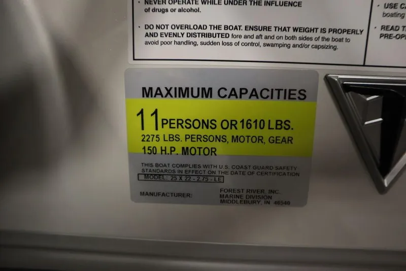 Slide: The Image of Trifecta 22RF LE 2.75 boat capacity label, 11 persons or 1610 lbs, 150 HP motor. - 29