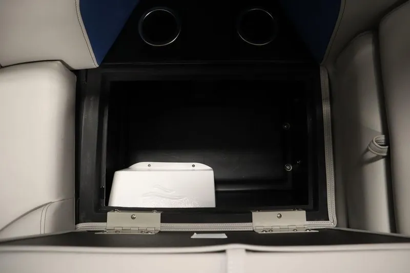 Slide: The Image of Storage compartment in 2025 Trifecta 22RF LE 2.75 boat, featuring sleek interior design. - 36