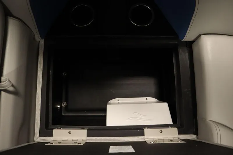 Slide: The Image of Storage compartment in 2025 Trifecta 22RF LE 2.75 boat, featuring sleek interior design. - 41