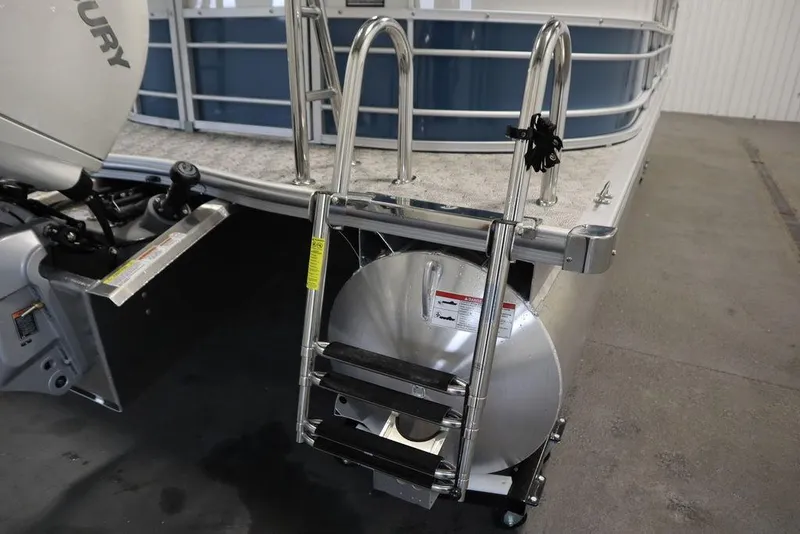 Slide: The Image of 2025 Trifecta 22RF LE 2.75 pontoon boat with Mercury engine and boarding ladder. - 46