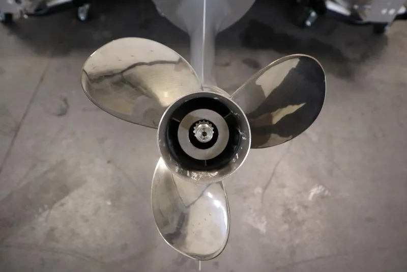 Slide: The Image of 2025 Trifecta 22RF LE 2.75 boat propeller, stainless steel, close-up view. - 49