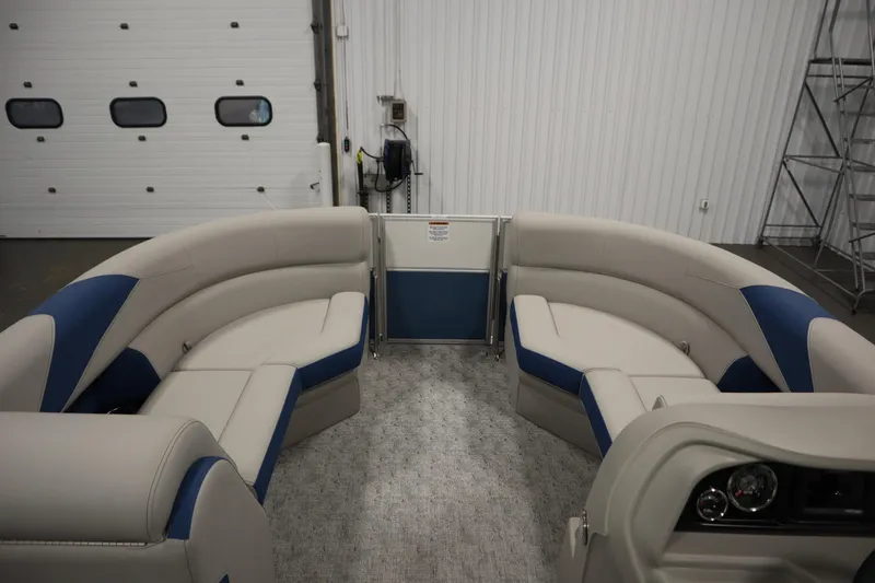 Slide: The Image of Interior of 2025 Trifecta 22RF LE 2.75 pontoon boat with plush seating. - 9