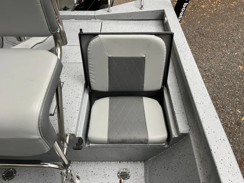 Slide: The Image of 2022 Xpress H22 boat seat with gray and black upholstery. - 11