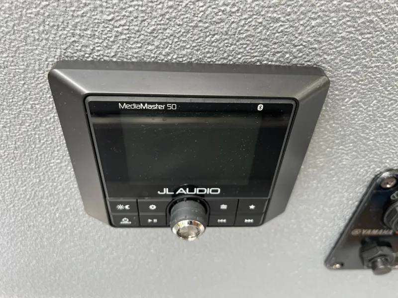 Slide: The Image of JL Audio MediaMaster 50 control panel on Xpress H22, 2022 model. - 19