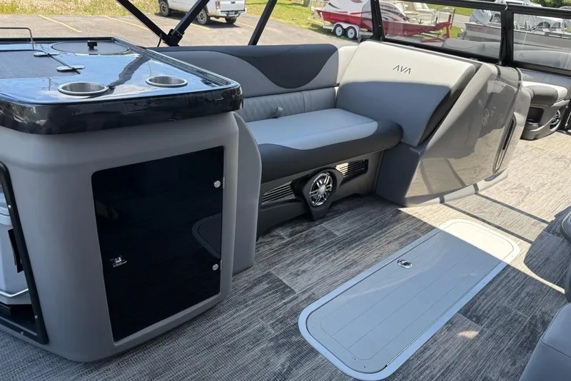 Slide: The Image of Interior of 2025 Avalon 2385 LSZ Elite Windshield boat with seating and storage. - 14