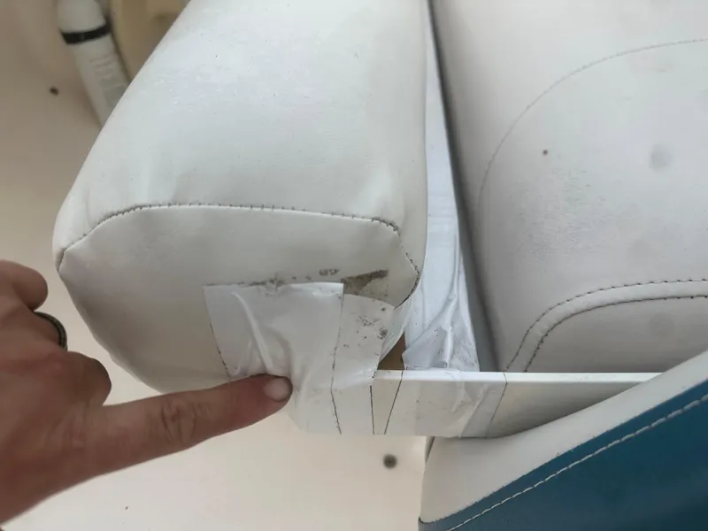 Slide: The Image of Boat seat repair on 2007 Hurricane SunDeck 237 OB with tape. - 17