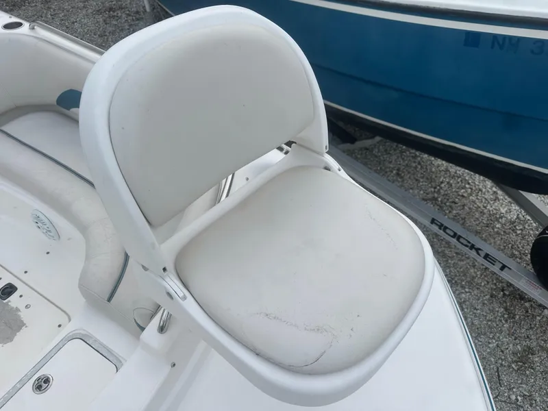 Slide: The Image of White seat on 2007 Hurricane SunDeck 237 OB boat, showing slight wear. - 41