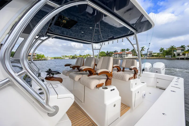Slide: The Image of 2022 Valhalla V-46 Center Console boat interior with luxurious seating and sleek design. - 18