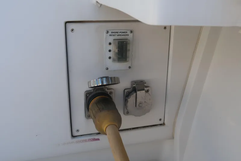 Slide: The Image of Shore power inlet on 2002 Luhrs 40 Convertible boat. - 13