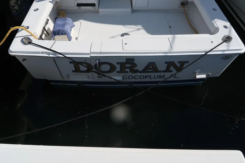 Slide: The Image of Luhrs 40 Convertible 2002 boat named "Doran" docked in Cocoplum, FL. - 29