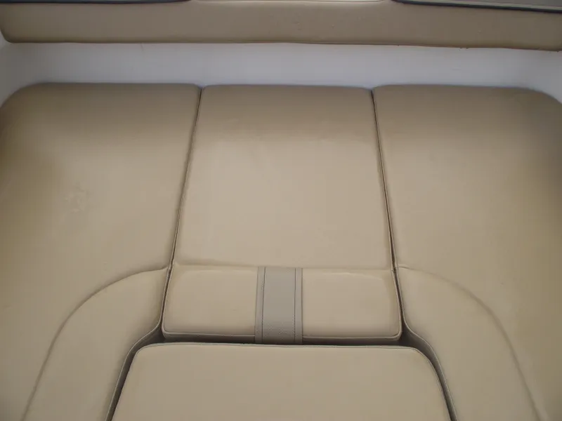 Slide: The Image of 2025 Bayliner D20 beige leather boat seating, close-up view. - 12