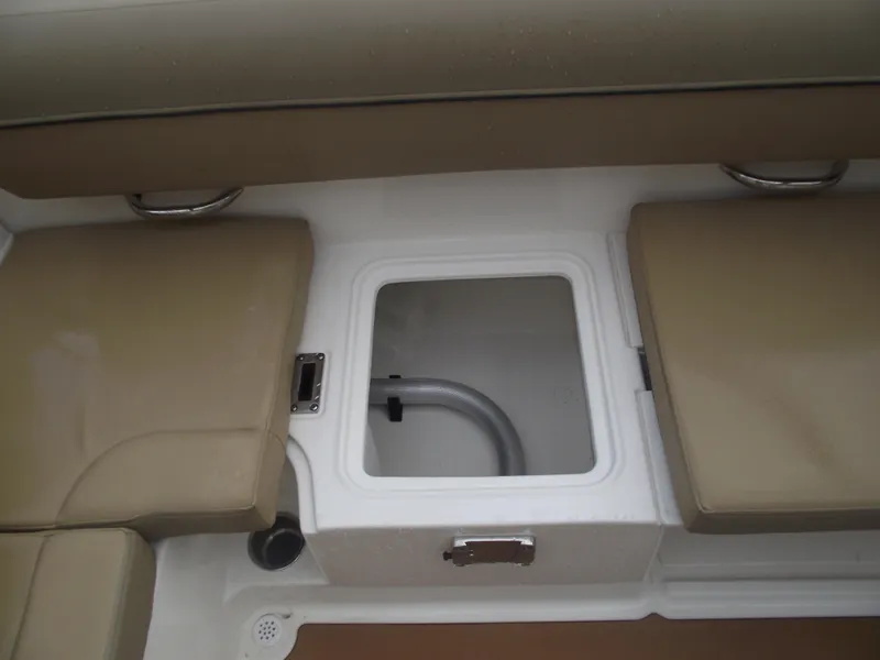 Slide: The Image of 2025 Bayliner D20 boat seating with storage compartment. - 24