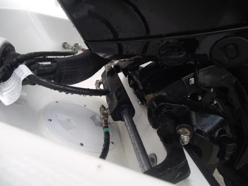 Slide: The Image of Close-up of 2025 Bayliner D20 boat engine components and wiring. - 38