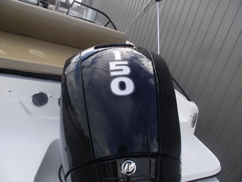 Slide: The Image of Bayliner D20 2025 boat with a 150 horsepower engine, rear view. - 5