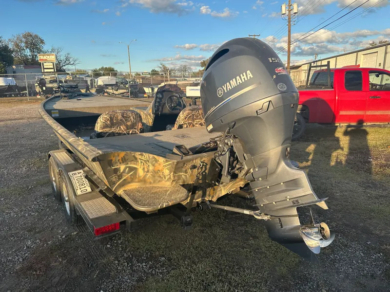 Slide: The Image of 2022 War Eagle 2070 Blackhawk boat with Yamaha outboard motor on trailer. - 5