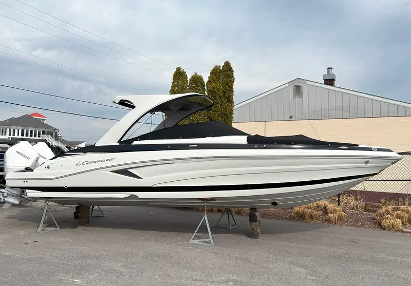 The Image of 2025 Crownline 310 XSS boat on display, featuring sleek design and modern features. - 0