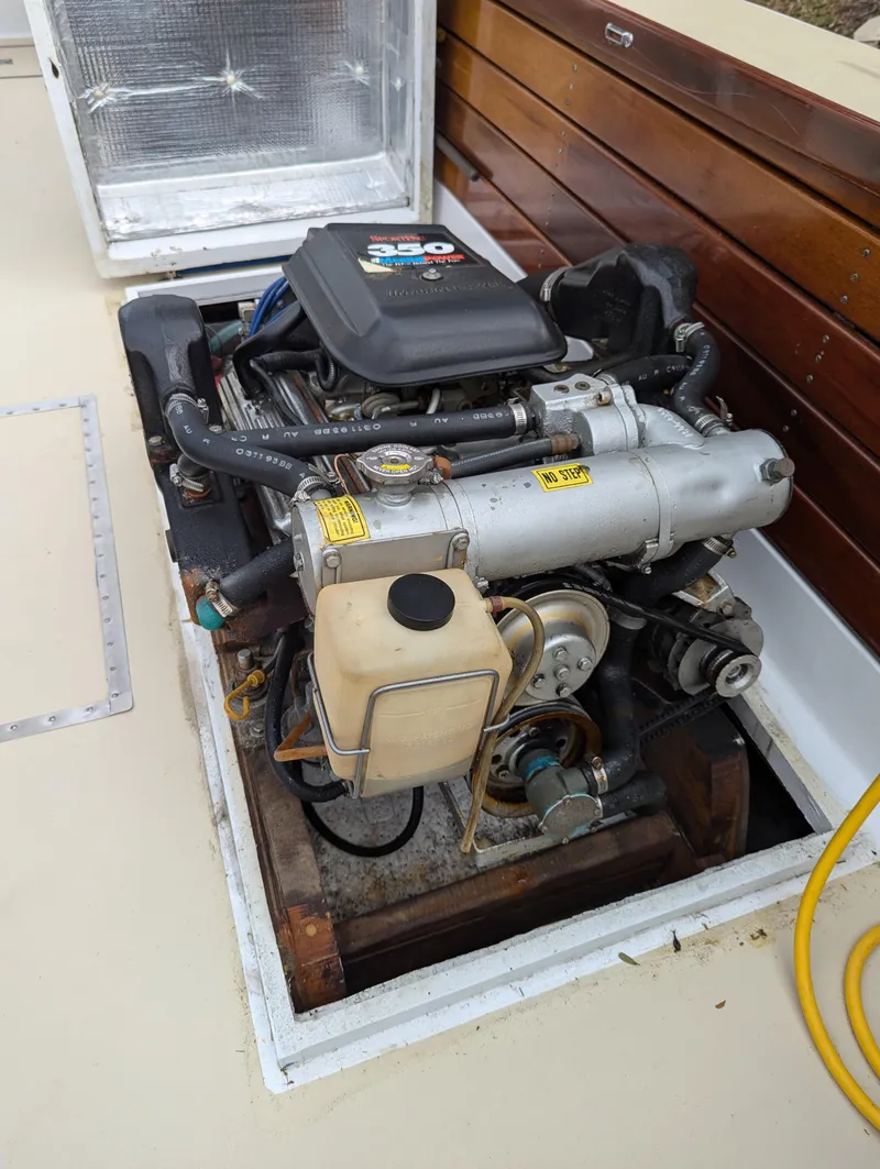 Slide: The Image of 1951 Huckins Fairform Flyer engine compartment with visible motor and components. - 30