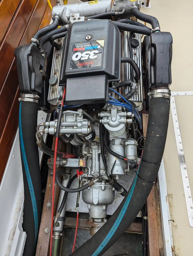 Slide: The Image of 1951 Huckins Fairform Flyer engine, showcasing a powerful 350 horsepower motor. - 31