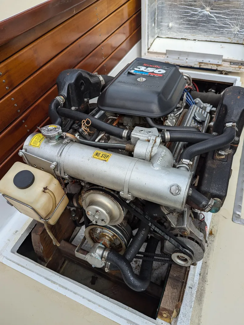 Slide: The Image of 1951 Huckins Fairform Flyer engine, detailed view, showcasing mechanical components and design. - 32