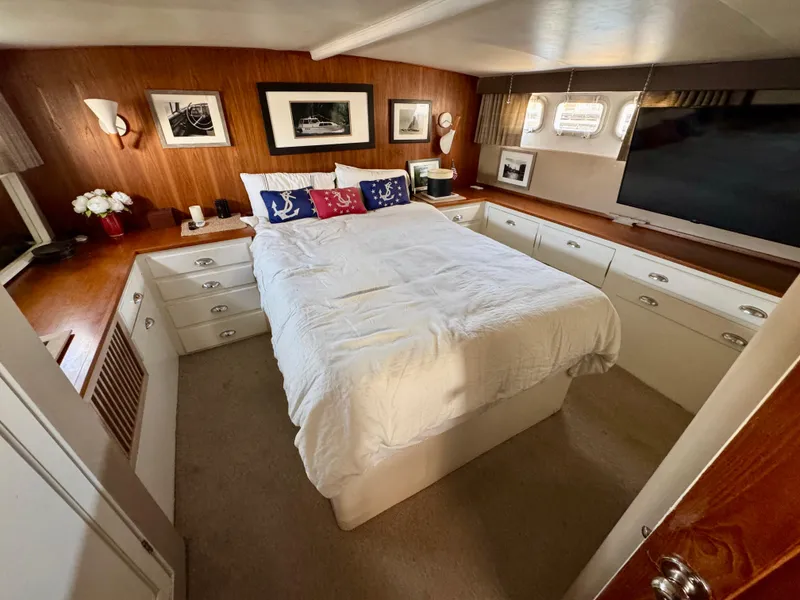 Slide: The Image of Luxurious bedroom in 1972 Stephens Brothers Flush Deck Motoryacht with nautical decor. - 22