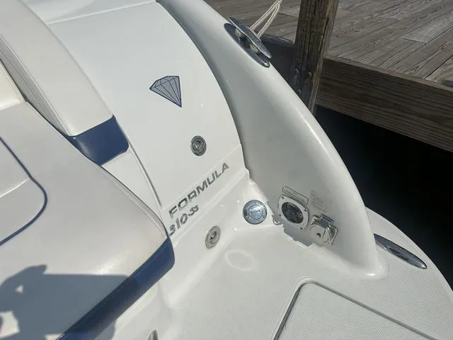 Slide: The Image of 2008 Formula 310 Sun Sport boat detail near dock. - 10