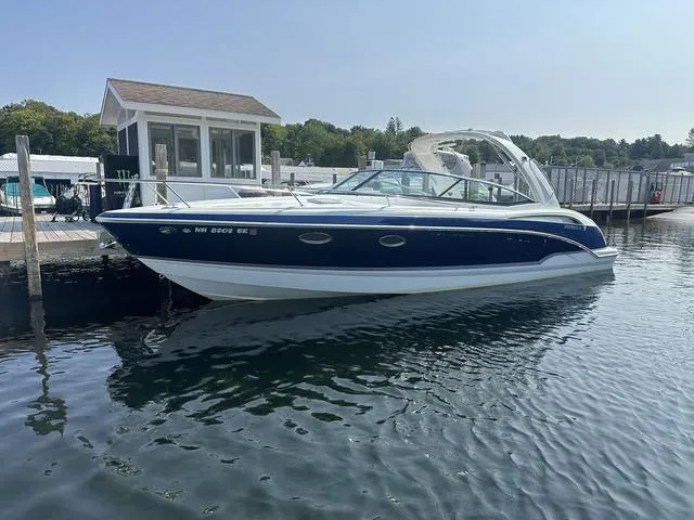 Slide: The Image of 2008 Formula 310 Sun Sport boat docked at marina. - 2