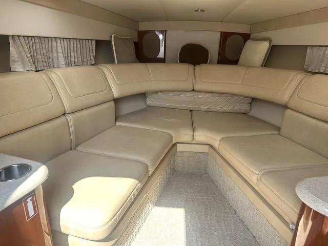 Slide: The Image of Interior of 2008 Formula 310 Sun Sport boat with beige seating and modern design. - 20