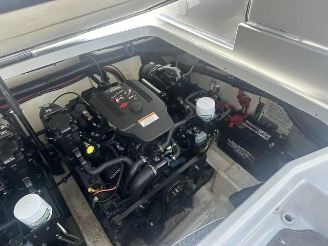 Slide: The Image of Engine compartment of a 2008 Formula 310 Sun Sport boat, showcasing dual engines. - 25