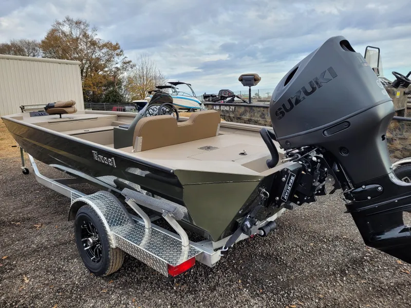 Slide: The Image of 2025 Excel 1960 Stalker SC boat with Suzuki outboard motor on a trailer. - 5