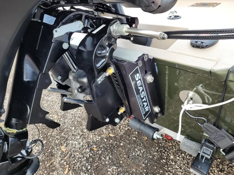 Slide: The Image of Close-up of 2025 Excel 1960 Stalker SC boat motor with SeaStar hydraulic steering. - 6