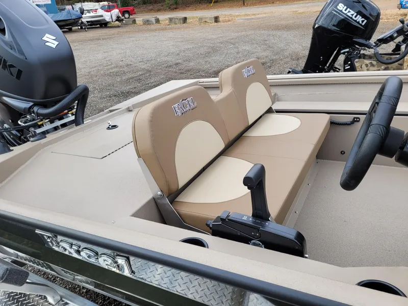 Slide: The Image of 2025 Excel 1960 Stalker SC boat interior with dual seats and steering wheel. - 8