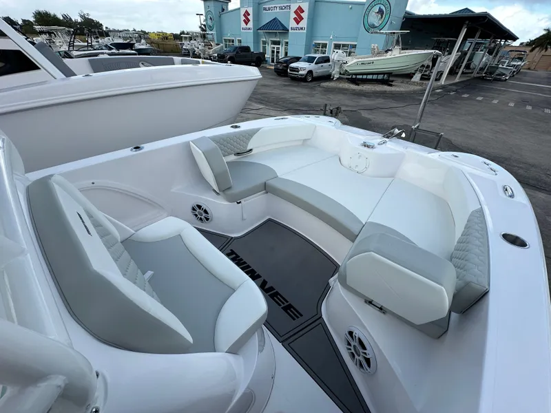 Slide: The Image of 2025 Twin Vee 240 GFX CC boat interior with sleek seating and modern design. - 5