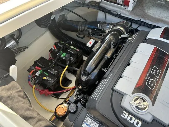 Slide: The Image of Engine compartment of a 2018 Chris-Craft Launch 23 boat, featuring a 6.2L engine. - 25