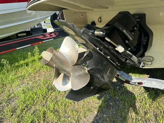 Slide: The Image of 2018 Chris-Craft Launch 23 boat propeller and drive system on grass. - 6