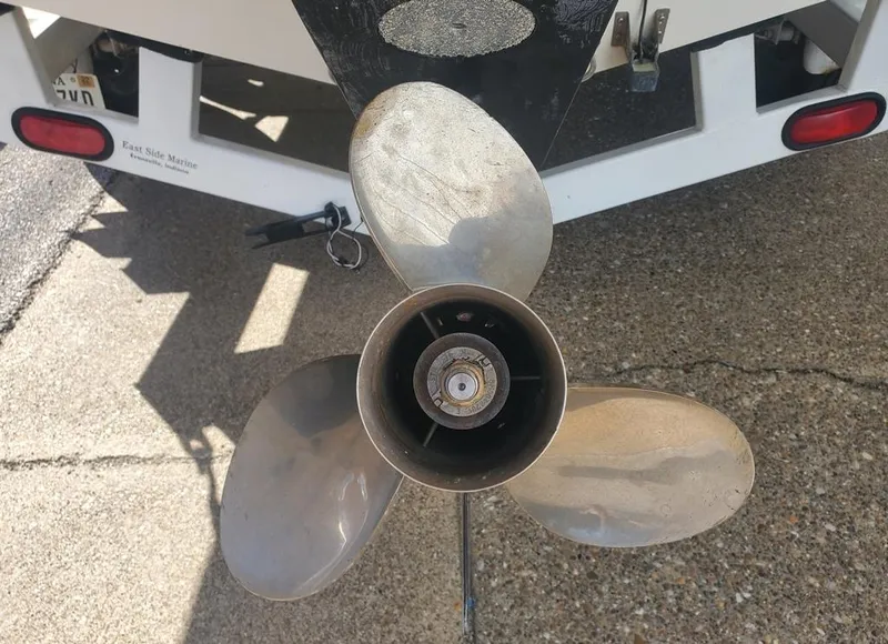 Slide: The Image of Propeller of 1996 Sea Ray 215 Express Cruiser on trailer. - 20